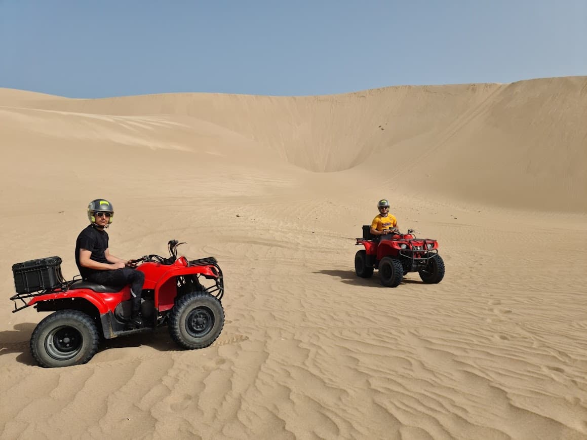 Quad sunset on dunes